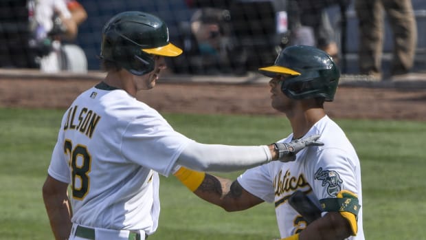 Matt Olson and Khris Davis had big homers Monday, but none of the A's hit with runners in scoring position